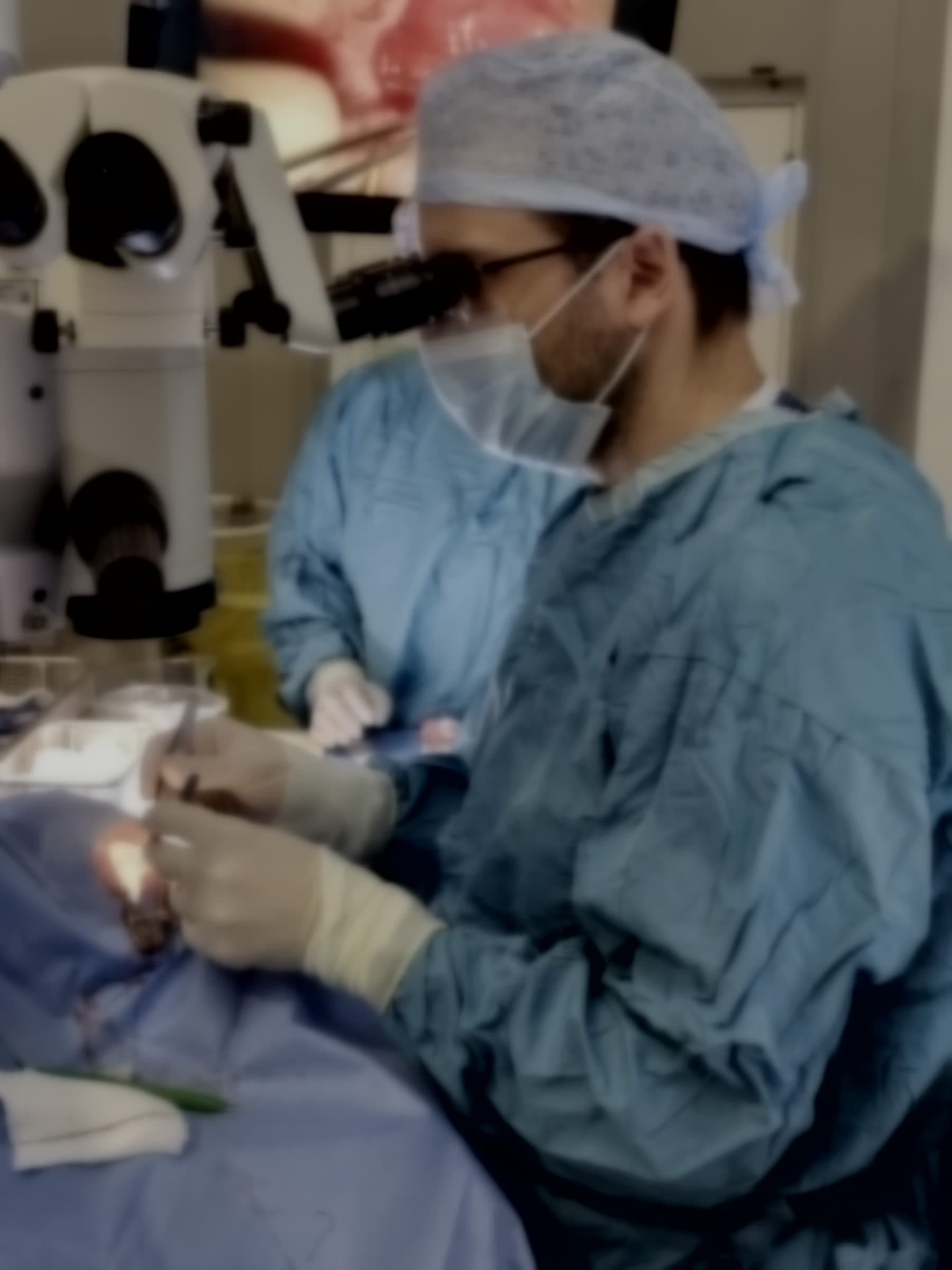 Sterile ophthalmic operating field under a surgical microscope.